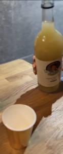 Customer about to pour ginger beer nectar